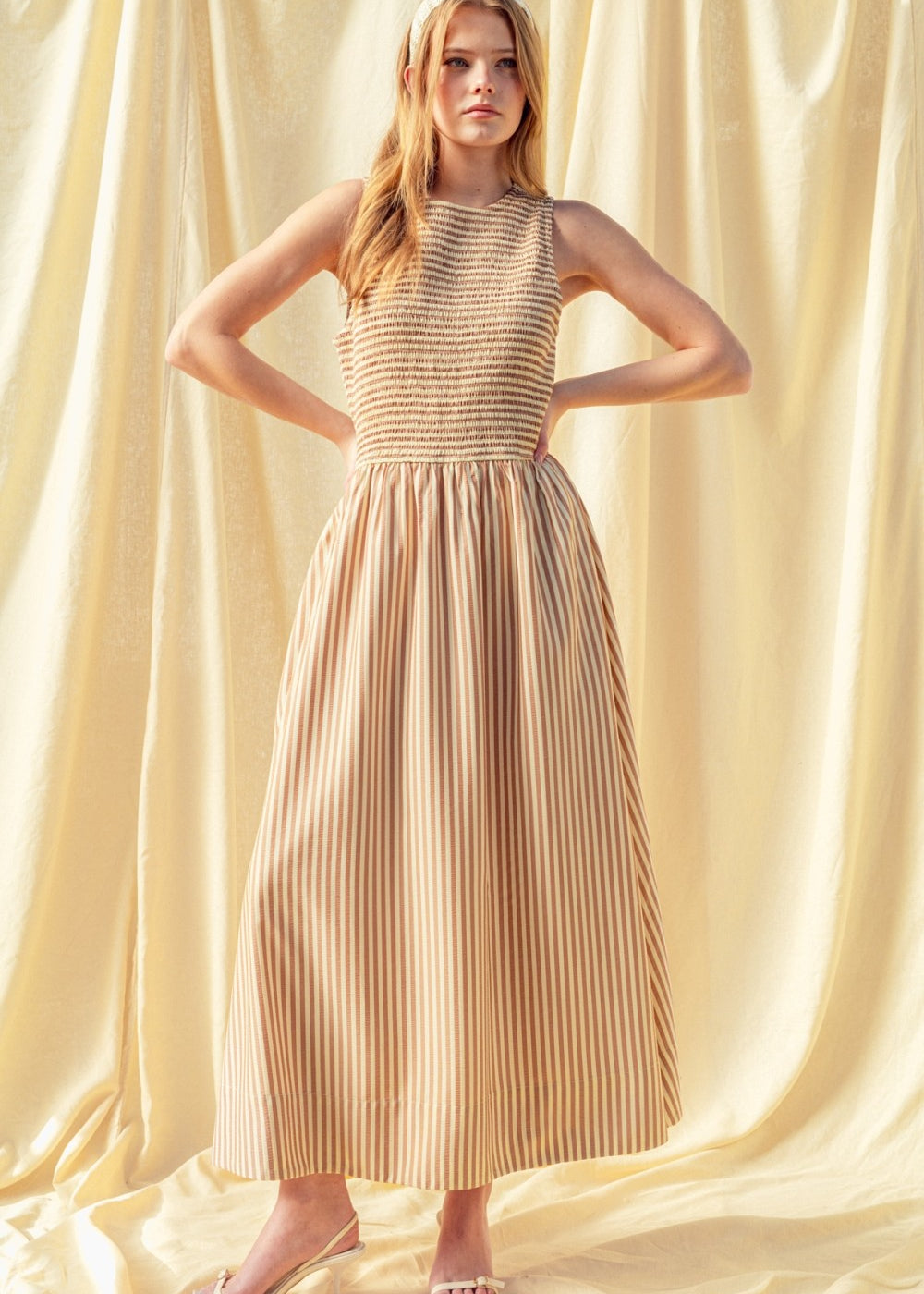 Darcy smocked stripe maxi dress in brown - front view