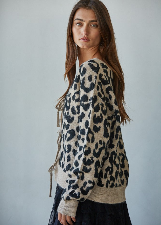 Side view of Feline Leopard Print Tie Cardigan in mocha black with tie-front design and long sleeves