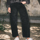 Front lifestyle view of model wearing Floral Embroidered Barrel Leg Jeans in faded black