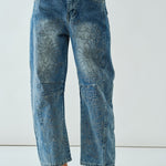 Front flat view of the Floral Embroidered Barrel Leg Jeans in medium wash