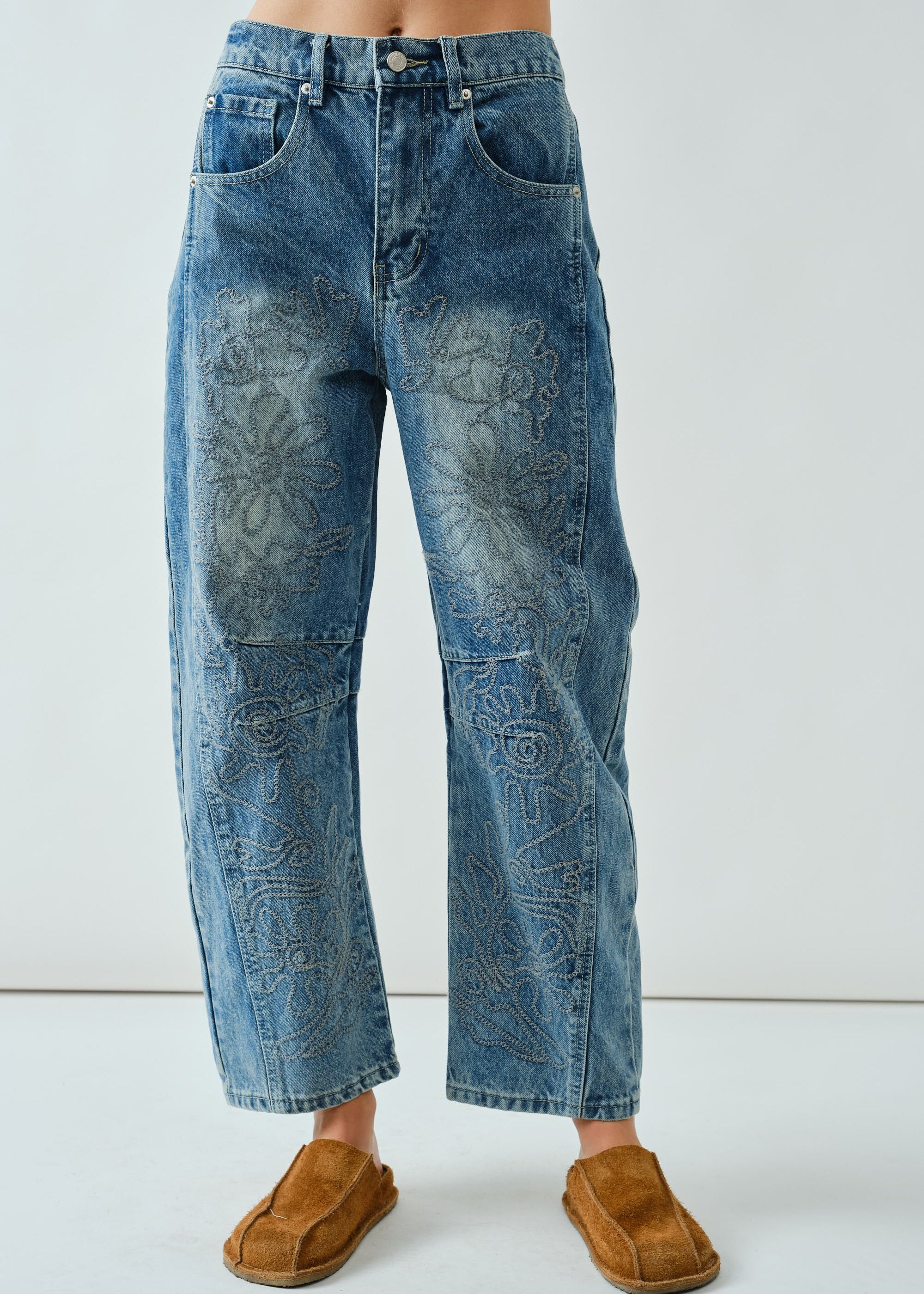Front flat view of the Floral Embroidered Barrel Leg Jeans in medium wash