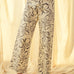 Floral print wide leg denim pants in charcoal with high-rise waist and stretch cotton fabric