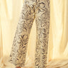Floral print wide leg denim pants in charcoal with high-rise waist and stretch cotton fabric