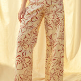 Floral print wide leg denim pants in red with high-rise waist and stretch cotton fabric
