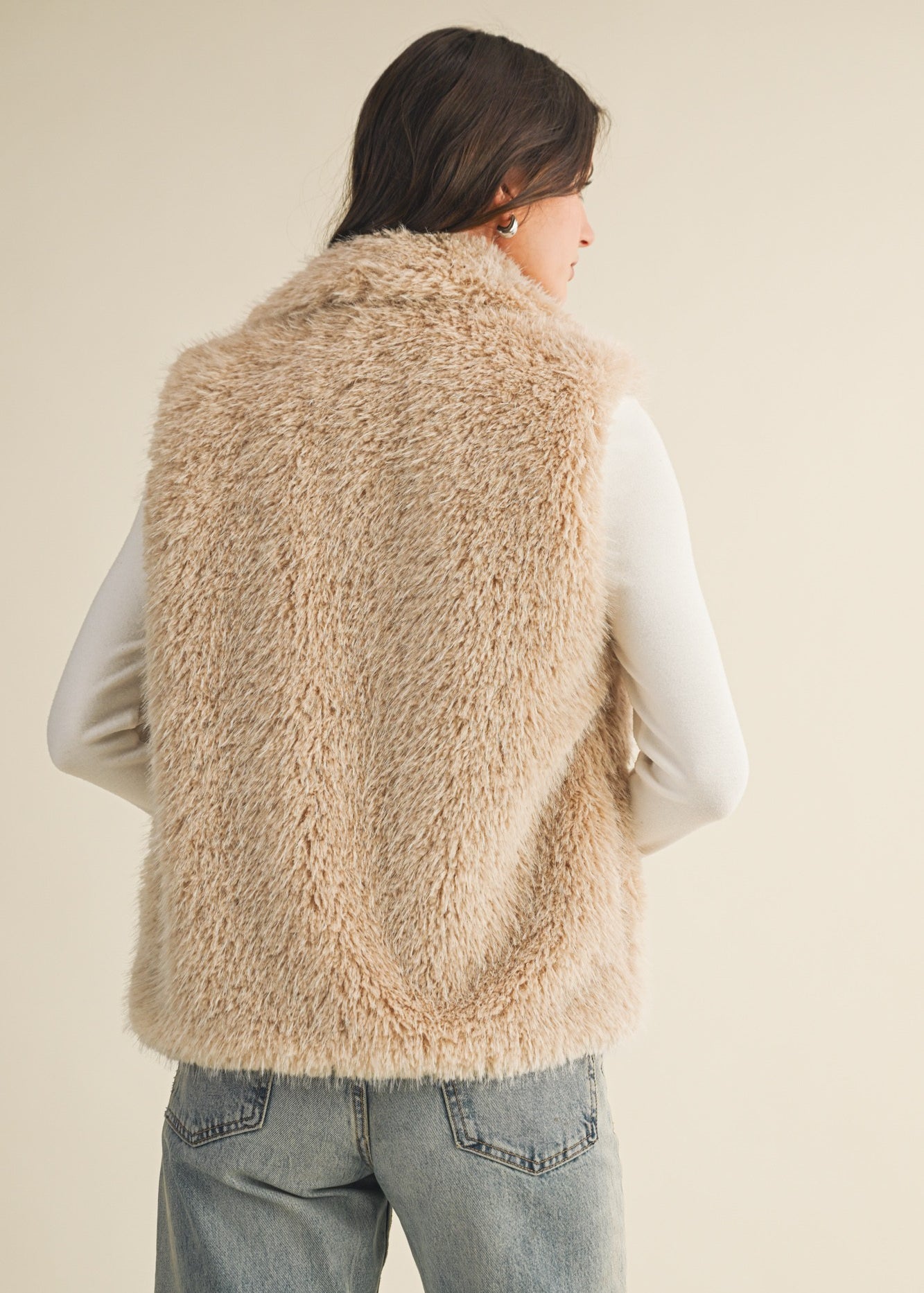 Back view of the Fuzzy Dream Faux Fur Vest showing relaxed fit