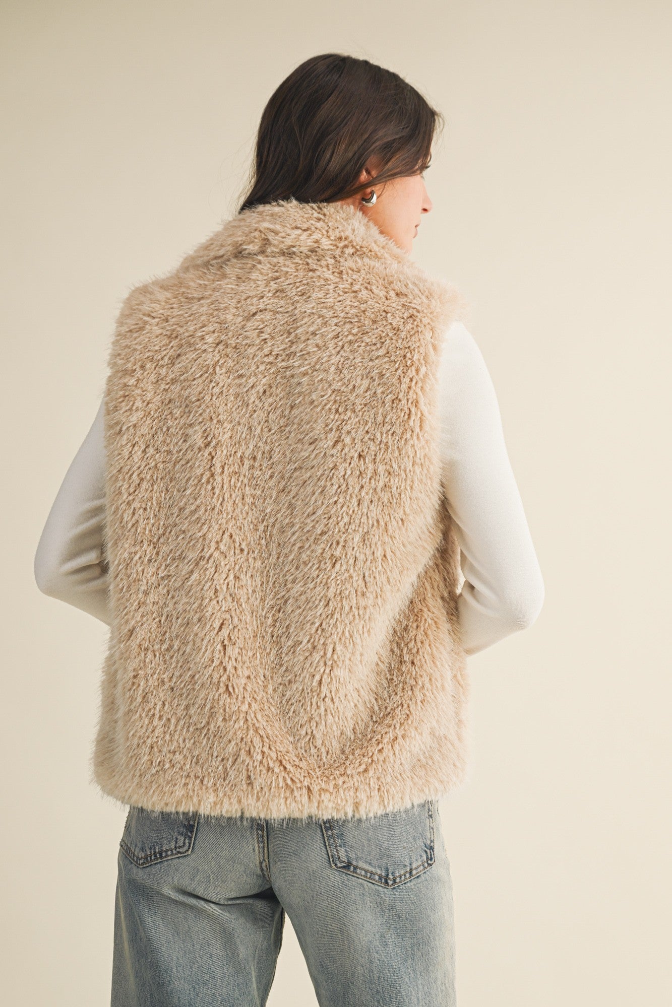 Back view of the Fuzzy Dream Faux Fur Vest showing relaxed fit