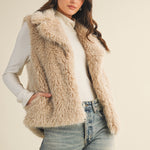 Front open view of the faux fur vest highlighting layering versatility