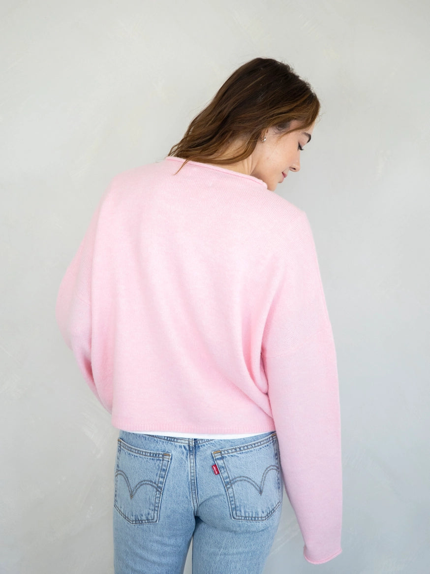 Back view of Hailey button down cardigan in baby pink