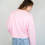 Back view of Hailey button down cardigan in baby pink