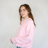 Side view of Hailey cardigan in baby pink showing relaxed fit