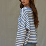 Side view of Hailey Button Down Cardigan in blue and ivory
