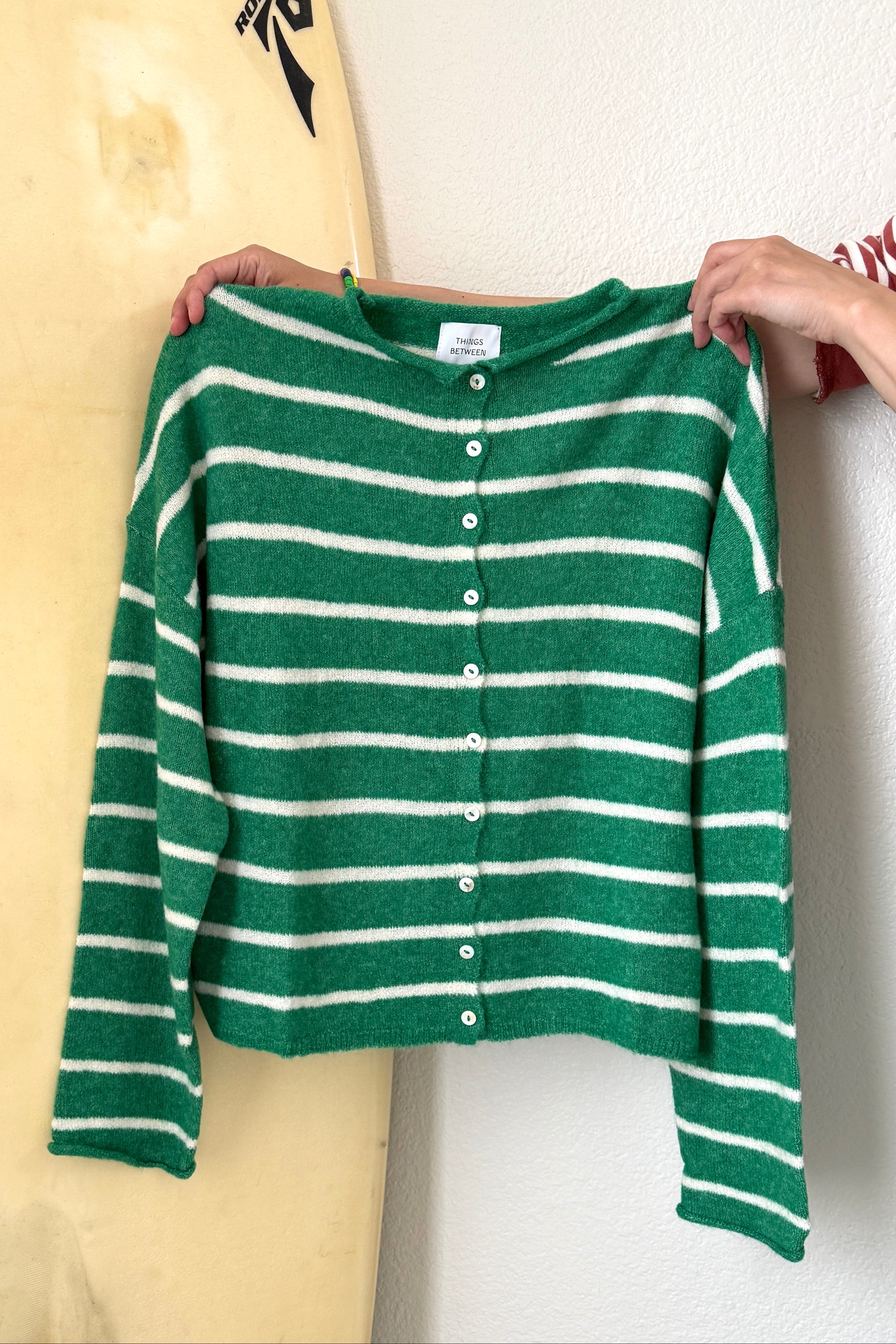 Hailey Piper Cardigan in Kelly green and white cabana stripe, flat lay front view