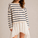 Model wearing the Hailey Button Down Cardigan in Cabana Stripe Natural-Navy in a relaxed standing outfit