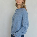 Side view of the Hailey Dusty Blue pin-striped cardigan showing its relaxed fit.