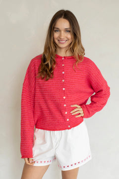 Woman wearing Hailey Button Down Cardigan in mini striped cherry red front view