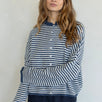 Woman wearing Hailey Button Down Cardigan in mini striped denim - front view