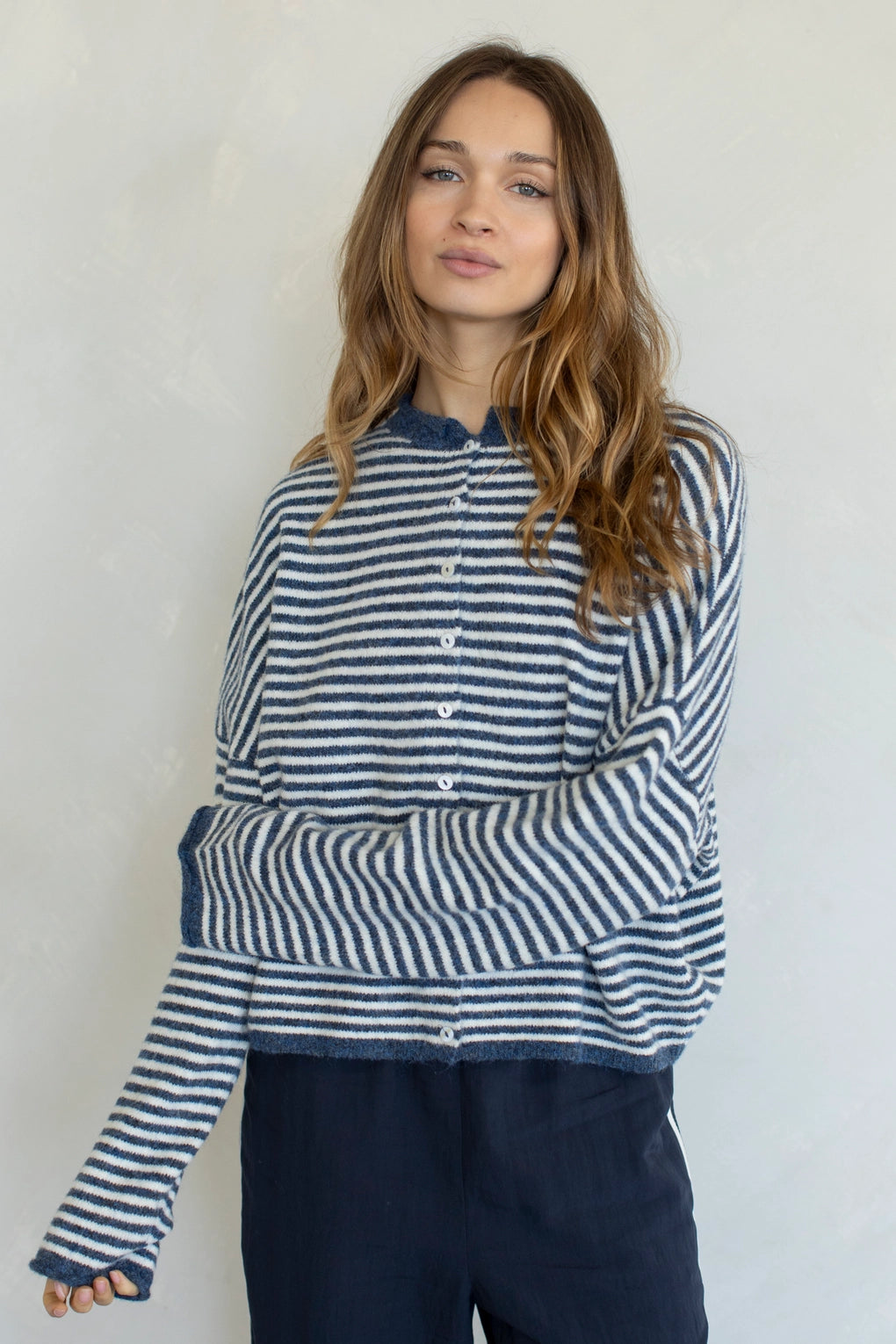 Woman wearing Hailey Button Down Cardigan in mini striped denim - front view