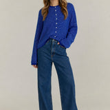 Royal blue pin-striped cardigan styled with casual denim outfit