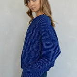 Side view of Hailey royal blue striped cardigan