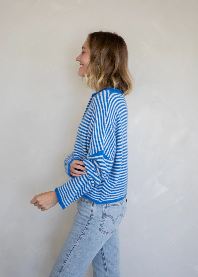 Side view of the Piper Cardigan (Hailey Button Down Cardigan) in mini striped blue — lightweight knit with relaxed fit.