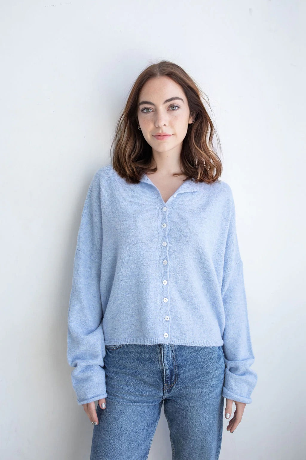 Model is wearing Hailey Button Down Cardigan – Sky Blue (also known as the Piper Cardigan) - front view
