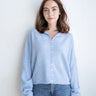 Model is wearing Hailey Button Down Cardigan – Sky Blue (also known as the Piper Cardigan) - front view