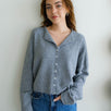 Front portrait of model wearing the Hailey Button Down Cardigan (Piper Cardigan) in heather grey