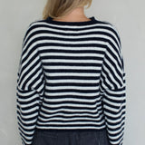 Back view of the Piper Cardigan in navy striped showing classic silhouette