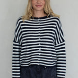 Front view of the navy striped Piper Cardigan showing button-down design