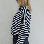 Side view of the Hailey Button Down Cardigan in navy striped highlighting relaxed fit