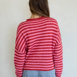 Back view of the Hailey Button Down Cardigan in a red and pink striped pattern.