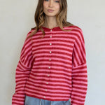 Front view of the Hailey Button Down Cardigan in a red and pink striped knit.
