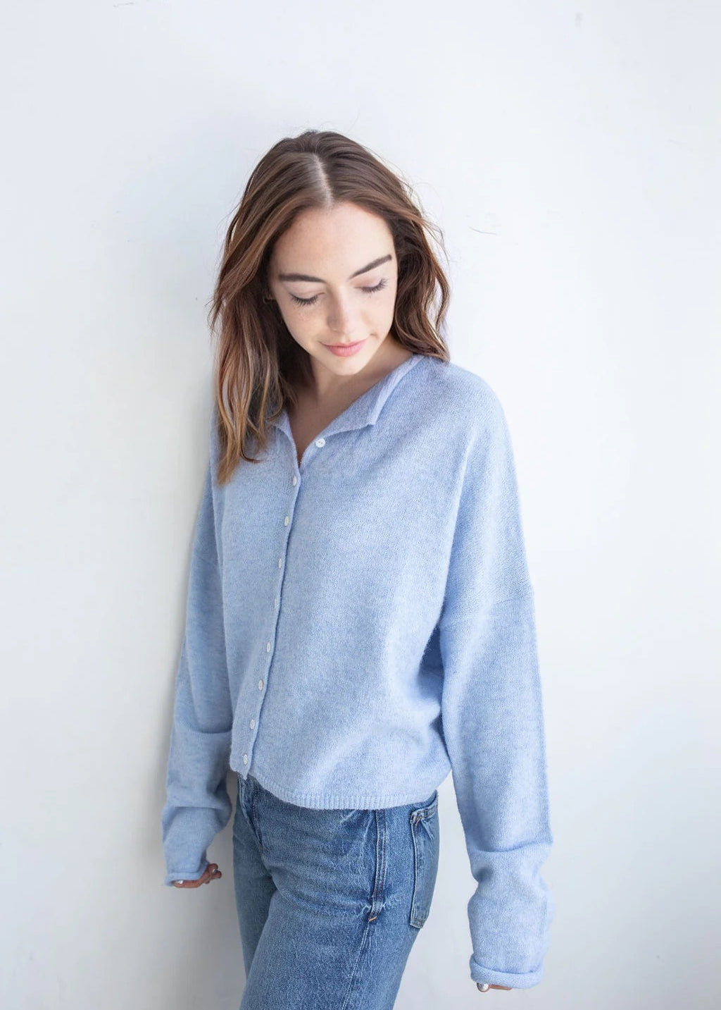 Model is wearing Hailey Button Down Cardigan – Sky Blue (also known as the Piper Cardigan) - side view