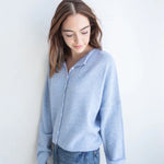 Model is wearing Hailey Button Down Cardigan – Sky Blue (also known as the Piper Cardigan) - side view