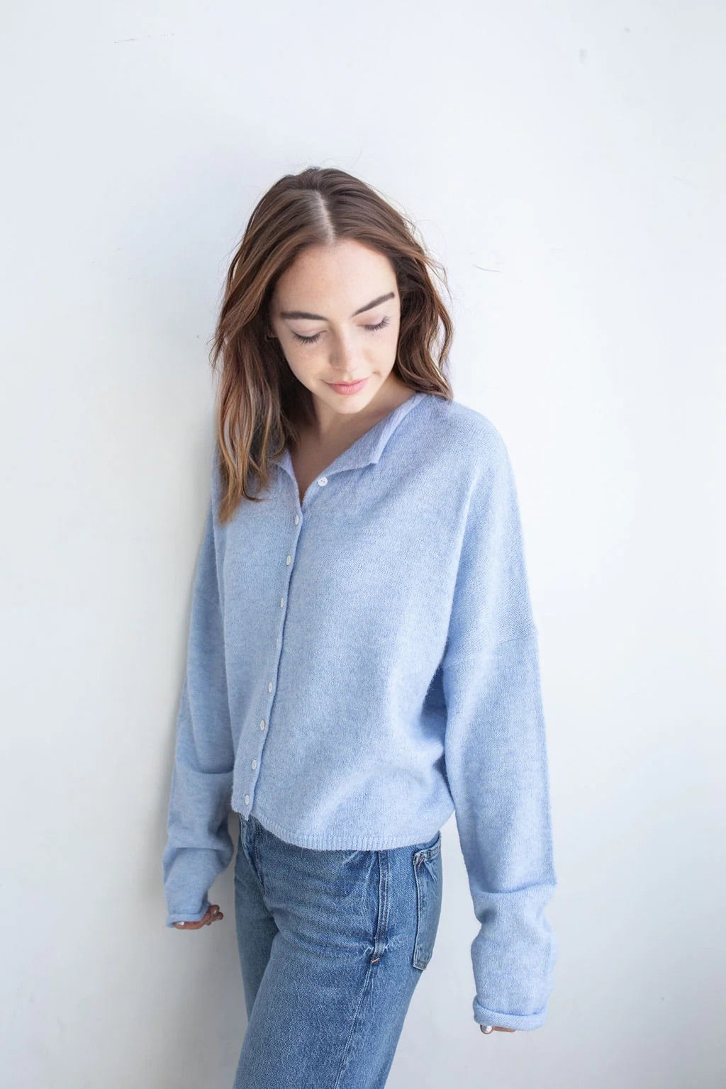 Model is wearing Hailey Button Down Cardigan – Sky Blue (also known as the Piper Cardigan) - side view
