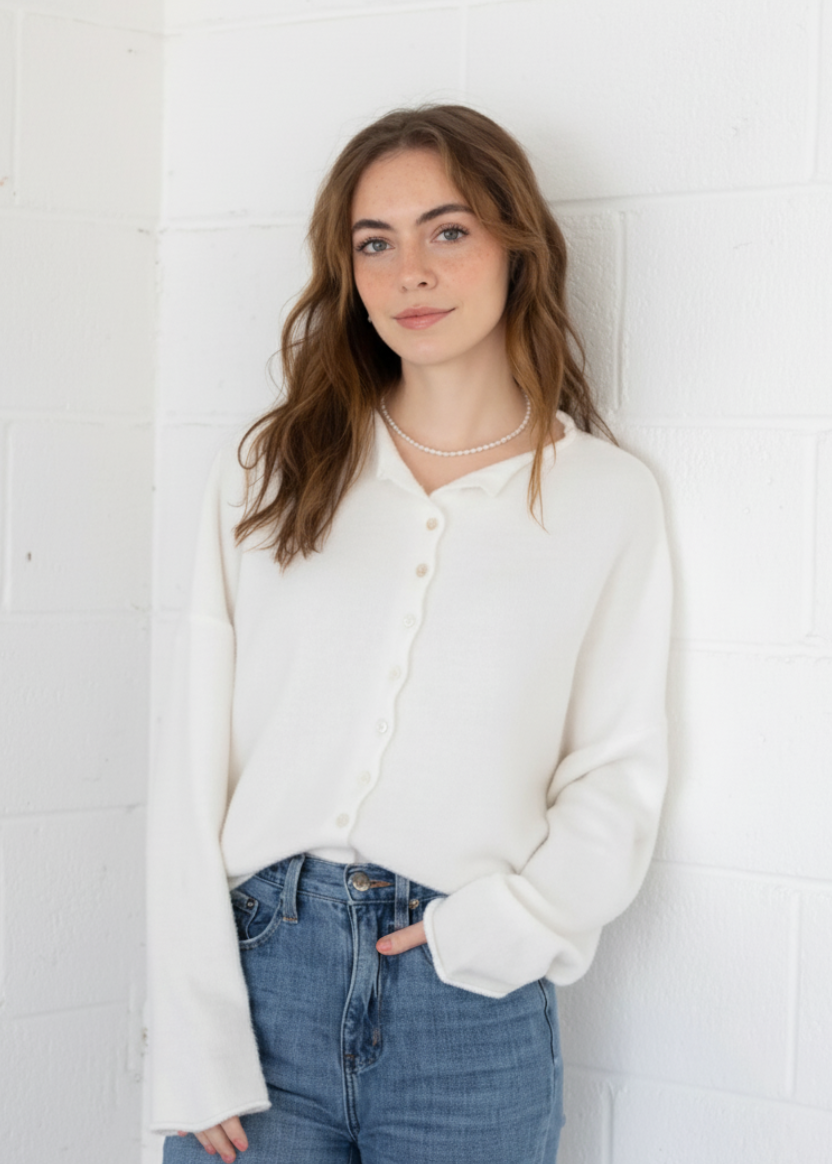 Styled front view of the Hailey Button Down Cardigan (Piper Cardigan) in off-white paired with jeans