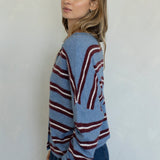 Side view of the Hailey Button Down Cardigan in Varsity Striped Dusty Blue