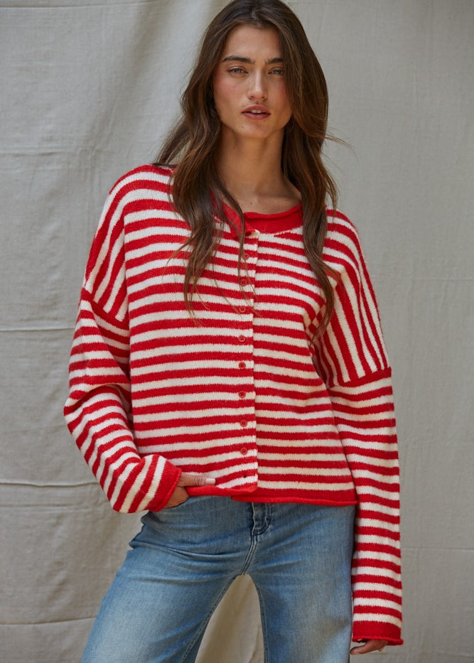Front portrait of model wearing the Hailey Button Down Cardigan Warmth Edition (Kelsey Cardigan) in red and ivory stripes