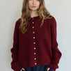 Woman wearing Hailey Button Down Cardigan in burgundy wine front view