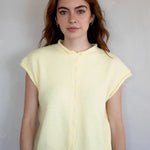 Front view of the Hailey Button Down Vest Cardigan in butter with button-down detail