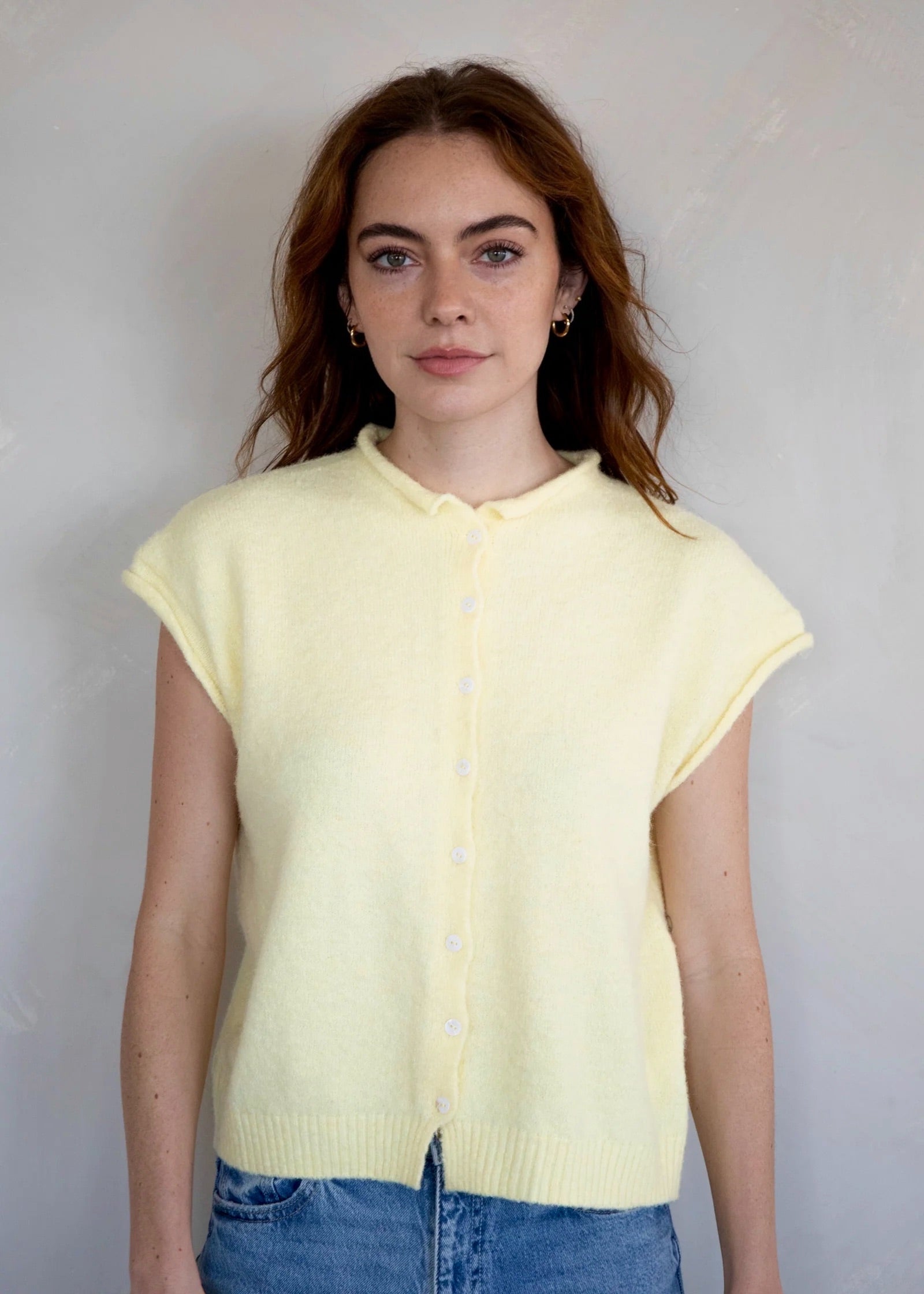 Front view of the Hailey Button Down Vest Cardigan in butter with button-down detail