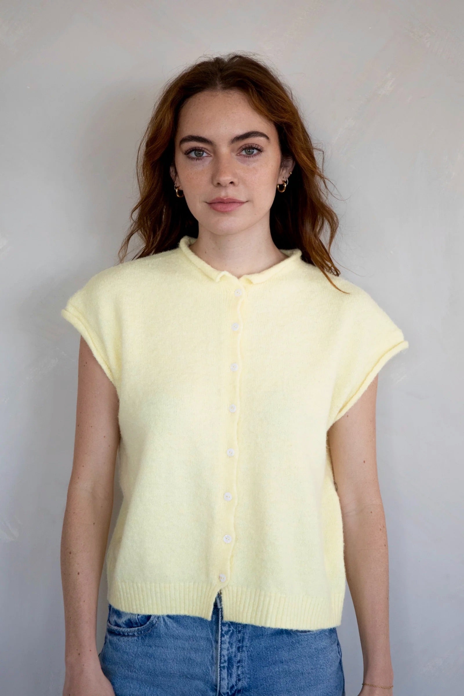 Front view of the Hailey Button Down Vest Cardigan in butter with button-down detail