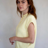 Side view of the Piper Vest Cardigan in butter showing sleeveless relaxed fit