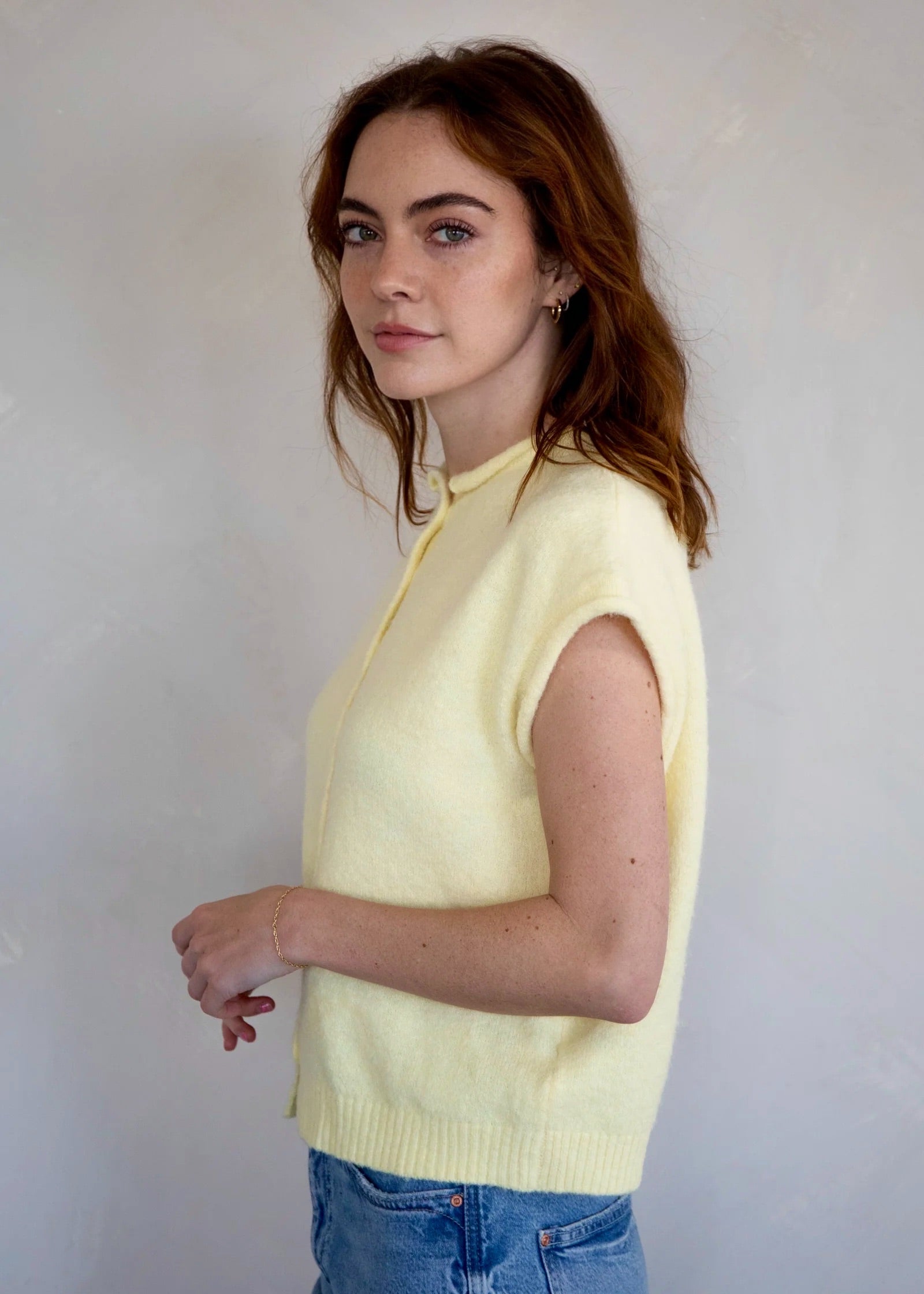 Side view of the Piper Vest Cardigan in butter showing sleeveless relaxed fit