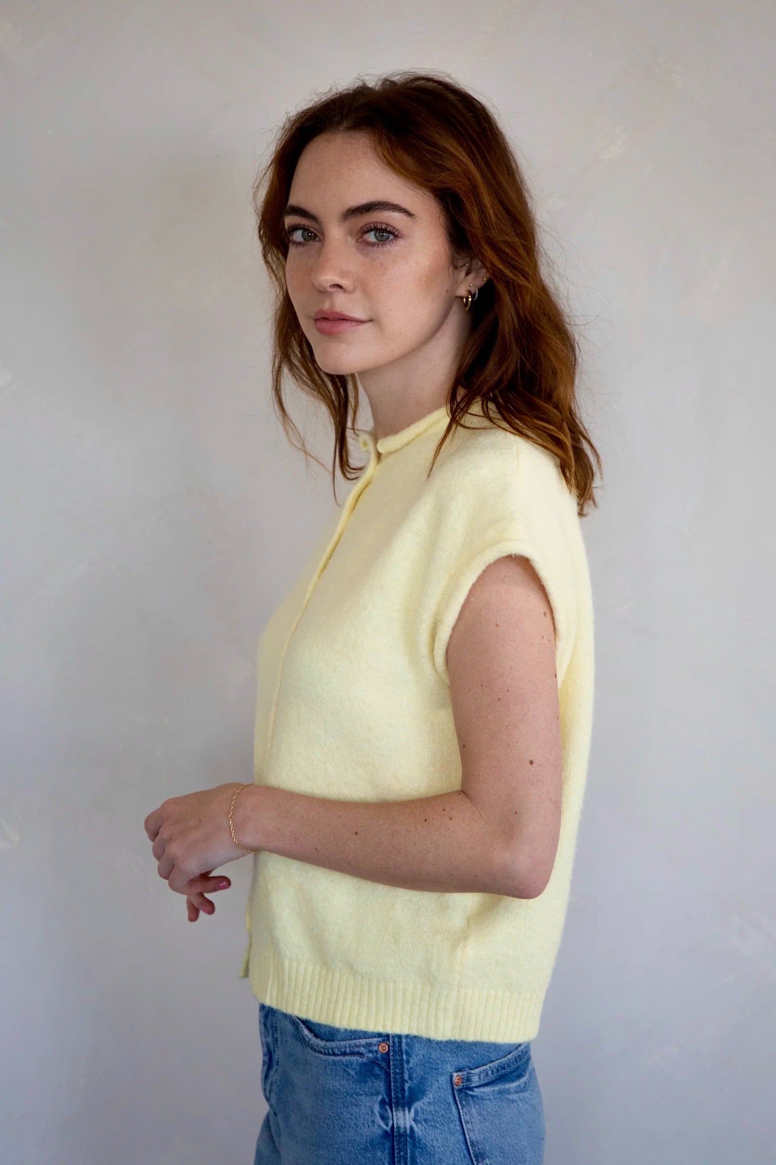 Side view of the Piper Vest Cardigan in butter showing sleeveless relaxed fit
