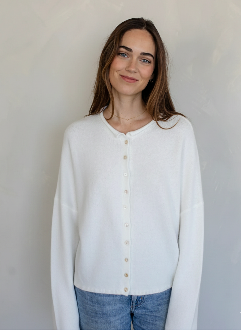 Front view of model wearing the Hailey Button Down Cardigan (Piper Cardigan) in white / off-white