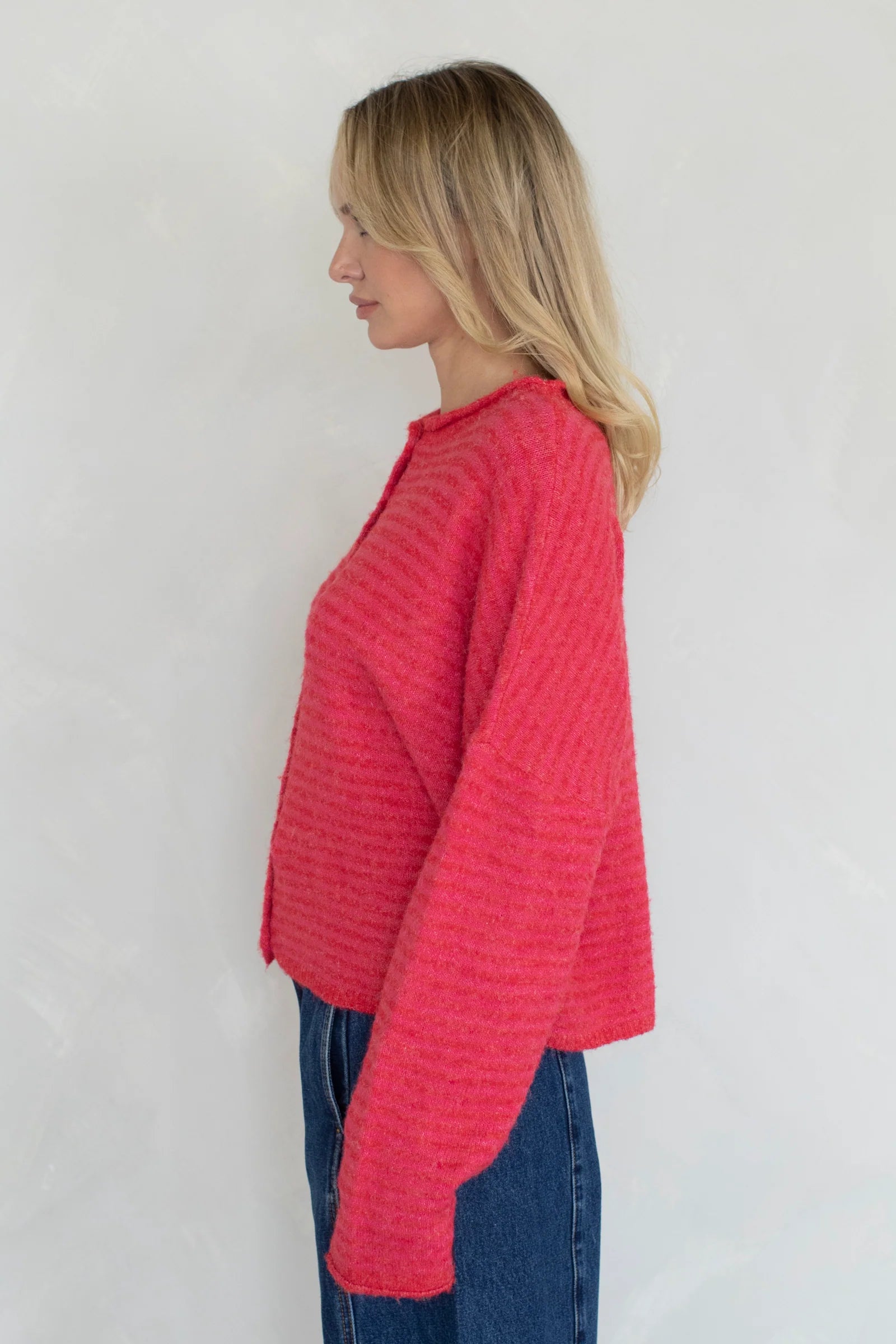 Side view of Hailey cardigan in cherry red mini stripe lightweight knit relaxed fit