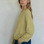 Side view of Hailey cardigan in honey pin stripe lightweight knit relaxed fit