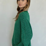 Side view of Hailey cardigan in kelly green pin stripe lightweight knit relaxed fit