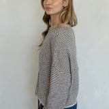 Side view of Hailey cardigan in natural pin stripe lightweight knit relaxed fit